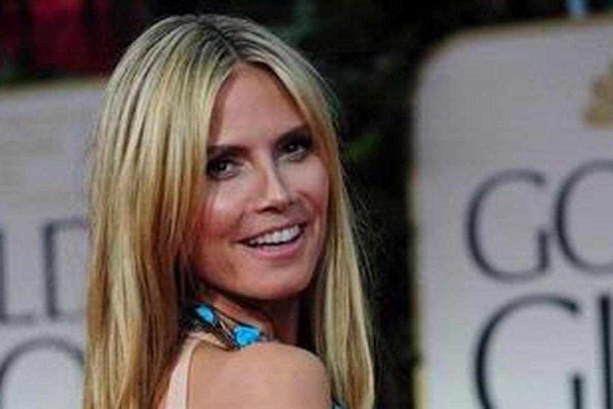 Heidi Klum hadir sendiri tak didampingi oleh suaminya, Seal, pada pergelaran Golden Globe Awards 2012 di Beverly Hills (California, AS), 15 Januari 2012 waktu setempat.   