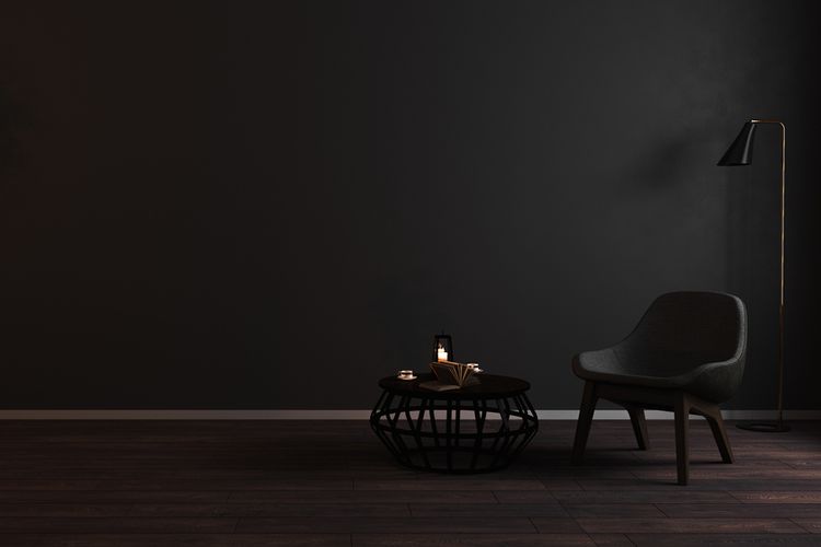 Ruang tamu di rumah minimalis modern yang memiliki furnitur berwarna hitam