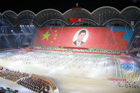 Datang ke Korut, Presiden Xi Jinping Disambut Nyanyian 
