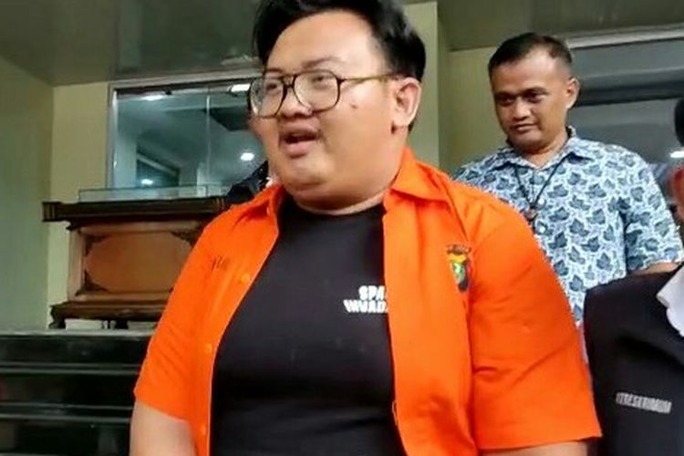 Yudo Andreawan saat digelandang penyidik Polda Metro Jaya, Jumat (14/4/2023).