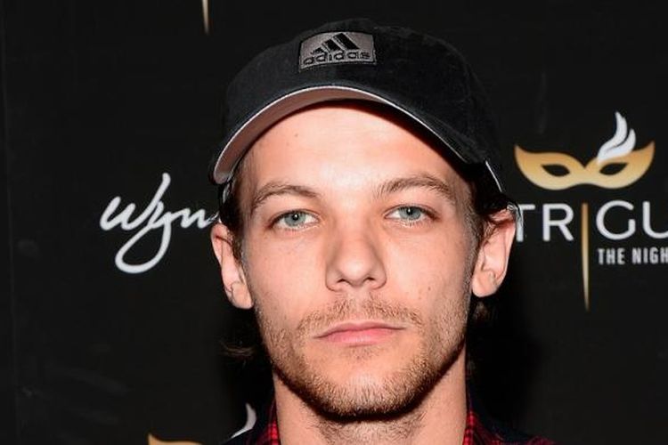 Vokalis Louis Tomlinson menghadiri pembukaan Intrigue Nightclub di Wynn Las Vegas, pada 29 April 2016. Personel One Direction itu ditangkap polisi Los Angeles akibat sebuah insiden di Bandara Internasional Los Angeles, Jumat (3/3/2017).
bryan steffy / AFP