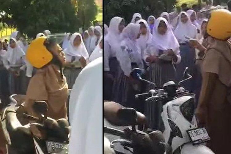Belasan siswa SMA Negeri 15 Maluku Tengah itu mem-bully guru yang hendak mengendarai sepeda motornya.
