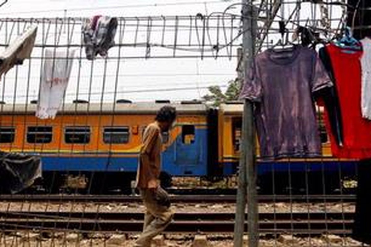 Ilustrasi kereta api kelas ekonomi.