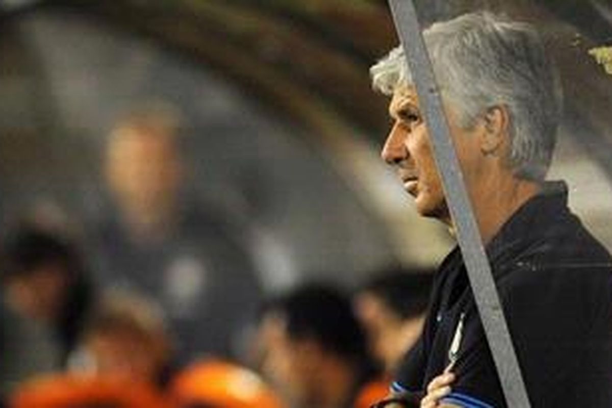 Ekpresi Pelatih Inter Milan, Gian Piero Gasperini, saat timnya takluk 0-1 dari Trabzonspor di matchday 1 Liga Champions Grup B, Rabu atau Kamis (15/9/2011) dini hari WIB.