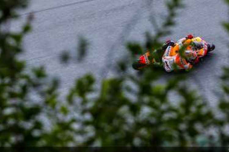 Pebalap Repsol Honda asal Spanyol, Marc Marquez, membalap di Sachsenring pada GP Jerman, Minggu (13/7/2014).