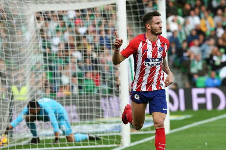 Saul Niguez merayakan gol Atletico Madrid ke gawang Real Betis pada pertandingan La Liga di Stadion Benito Villamarin, Minggu (10/12/2017).