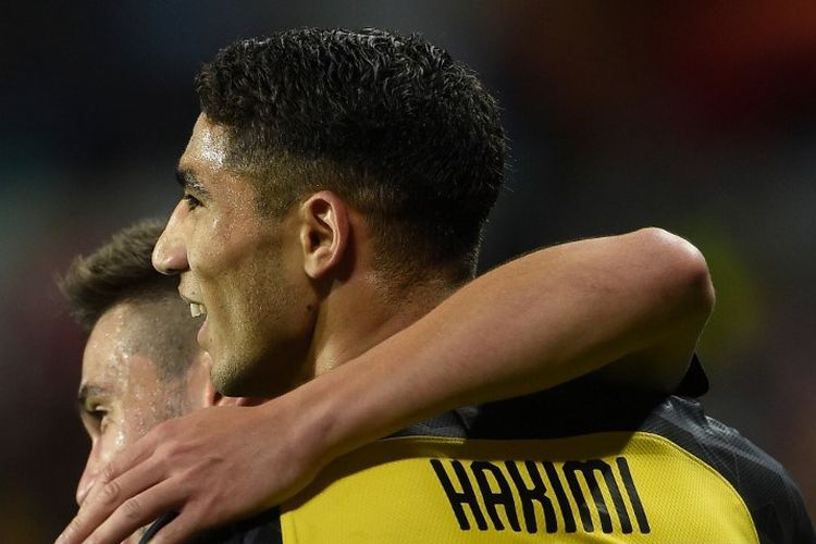 Achraf Hakimi merayakan golnya pada pertandingan Slavia Praha vs Borussia Dortmund dalam lanjutan Liga Champions, 2 Oktober 2019. 