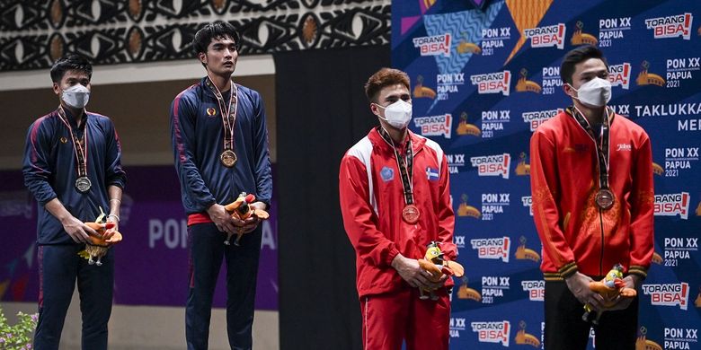 Klasemen Medali Bulu Tangkis Pon Papua Jabar Juara Umum Jatim Kedua Dki<script async src=