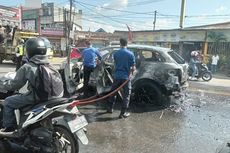 Mobil Mazda CX7 Mendadak Terbakar di Palembang