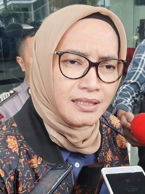 Komisioner KPU Evi Novida Ginting Manik usai diperiksa penyidik di Gedung Merah Putih KPK, Rabu (26/2/2020).