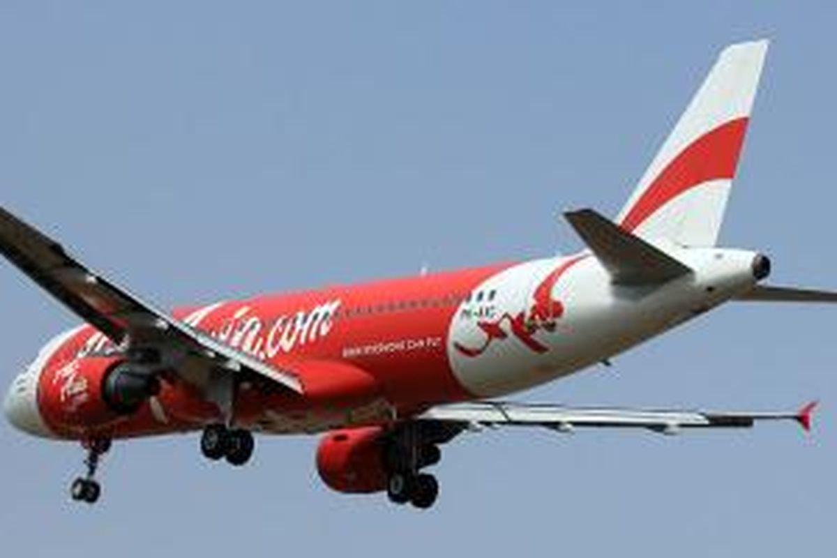 PK-AXC, Airbus A320-200 yang dioperasikan oleh maskapai Indonesia AirAsia, yang hilang sejak Minggu (28/12/2014). Registrasi PK-AXC bisa dilihat di bagian belakang fuselage (badan) pesawat. Foto diambil pada 17 Agustus 2012 di Bandara Soekarno-Hatta, Tangerang, Banten.