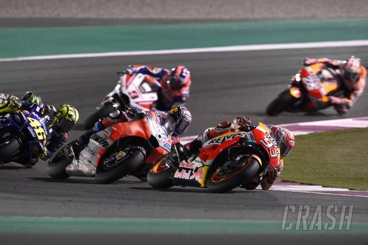 Marc Marquez saat berlaga di GP Qatar, Minggu (18/3/2018).