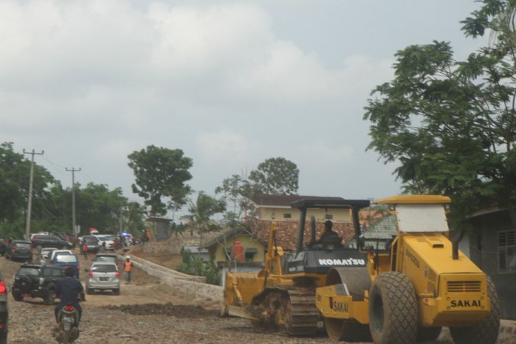 Pekerjaan konstruksi Kampung Cikadu.