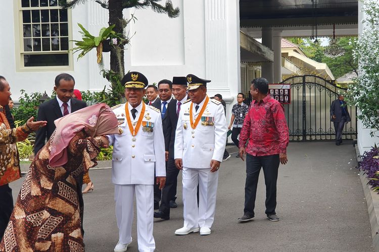 Gubernur dan Wagub Maluku Abdul Gani Kasian dan Al Yasin Ali usai dilantik Presiden Jokowi di Istana Negara, Jakarta, Jumat (10/5/2019).