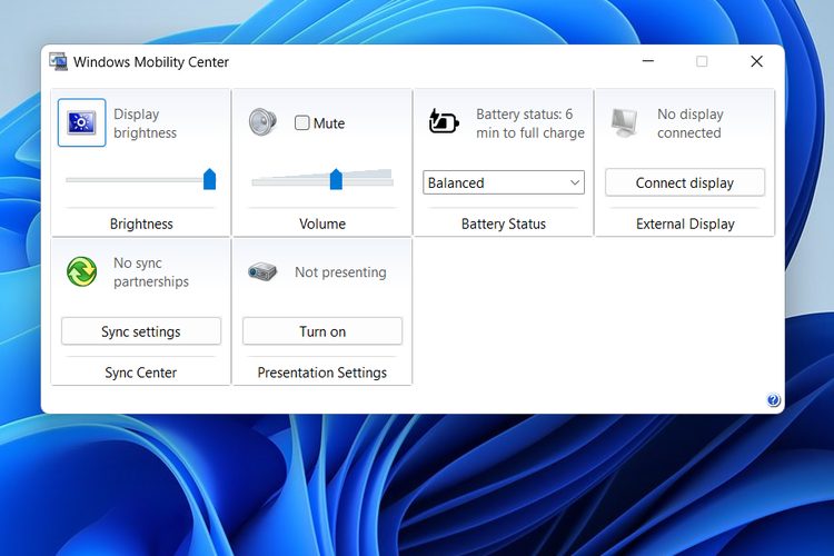 Ilustrasi cara mengatur kecerahan layar laptop Windows lewat Mobility Center.