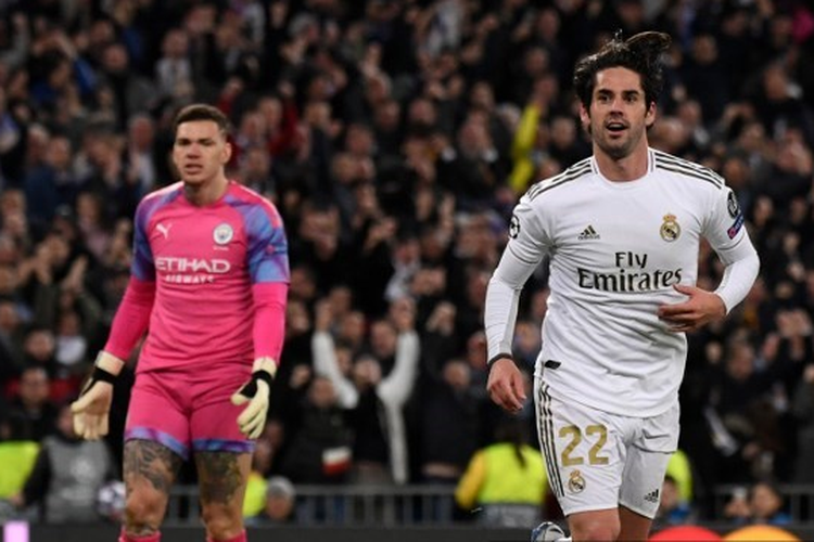 Isco merayakan gol yag dicetaknya di hadapan Ederson Moraes saat laga 16 besar Liga Champions yang mempertemukan Real Madrid vs Manchester City di Stadion Santiago Bernabeu, Madrid, Spanyol, Rabu, 27 Februari 2020.