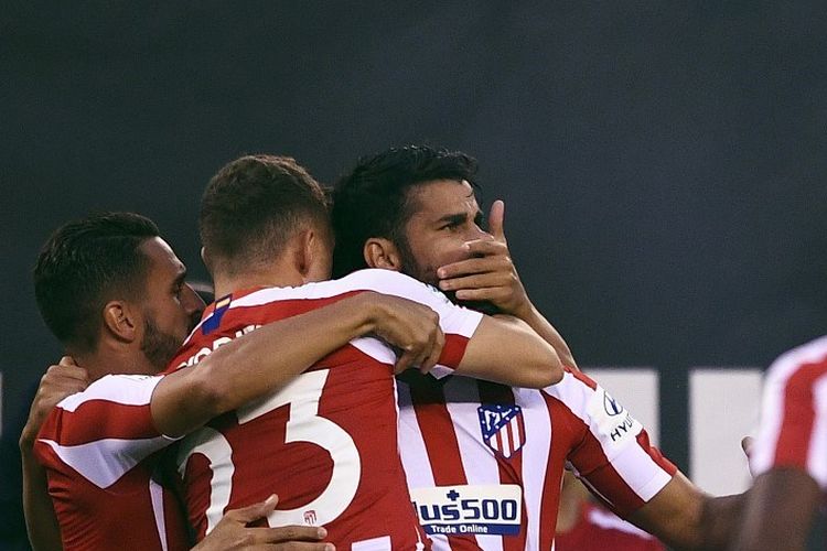 Diego Costa merayakan gol bersama rekan-rekannya pada pertandingan ICC 2019 antara Real Madrid vs Atletico Madrid di New Jersey, 26 Juli 2019. 