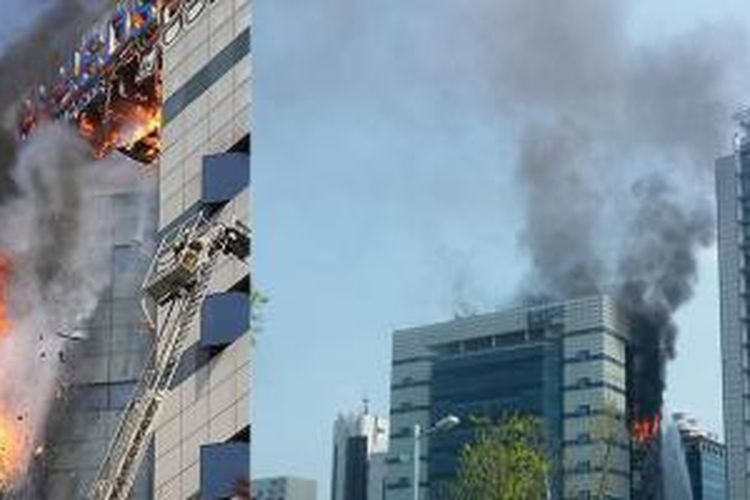 Beberapa foto kebakaran yang menimpa gedung kantor Samsung di Korea Selatan, Minggu (20/4/2014)