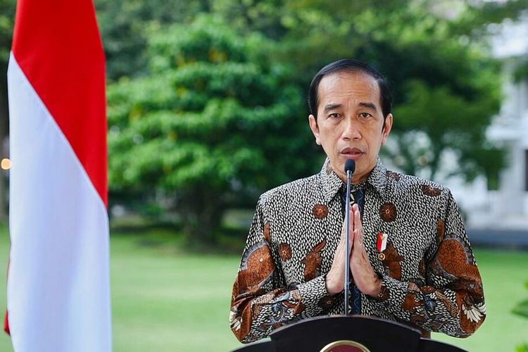 Indonesia's President Joko Widodo gestures with both palms close together at the upper part of the chest to wish all the Hindus who celebrate the Day of Silence in Indonesia. 