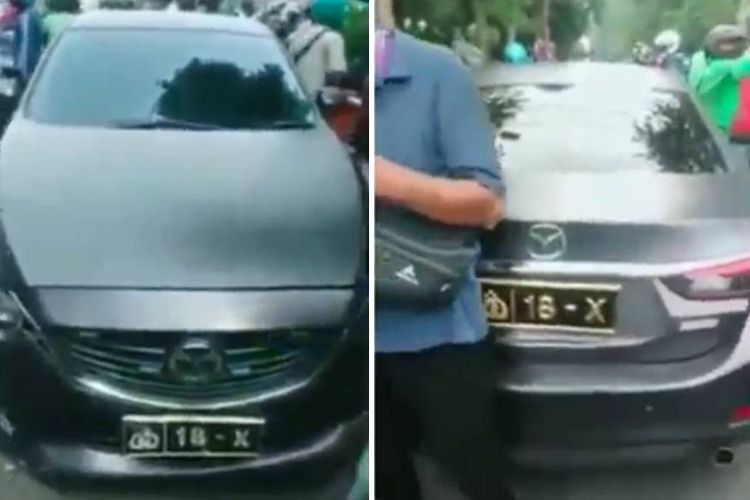 Tangkapan layar video bernarasi mobil dinas pejabat polisi melaju dengan ugal-ugalan dengan menerobos lampu merah hingga menabrak pemotor di Surabaya,