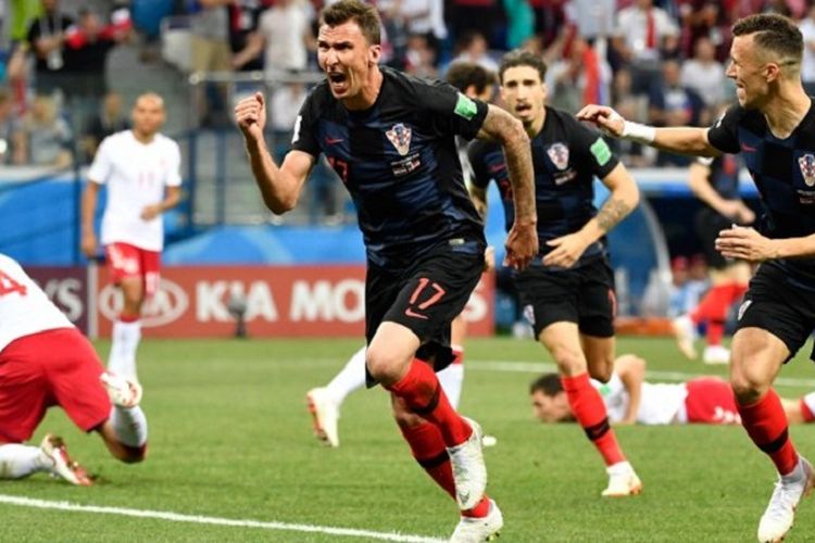 Mario Mandzukic merayakan gol Kroasia ke gawang Denmark pada pertandingan babak 16 besar Piala Dunia 2018 di Nizhny Novgorod, 1 Juli 2018. 