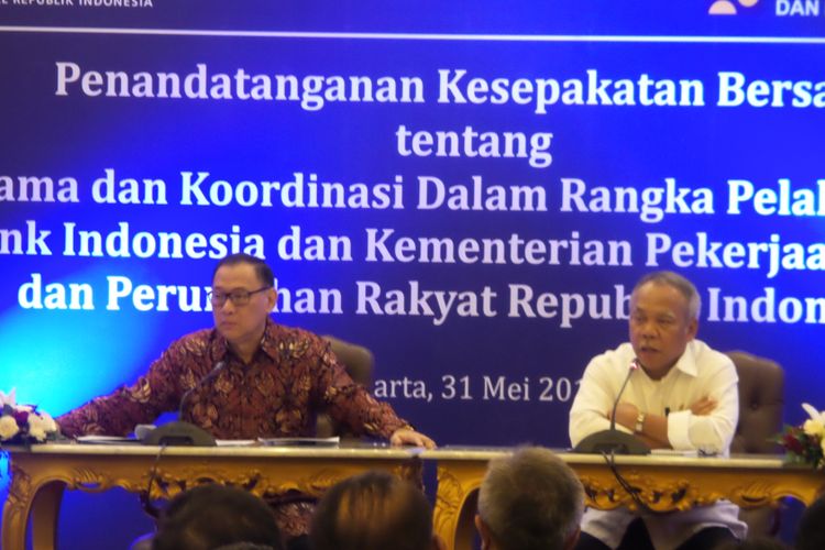 Gubenur BI Agus Martowardojo dan Menteri PUPR Basuki Hadimuljono memberikan keterangan usai menandatangani nota kesepahaman di Kantor BI, Rabu (31/5/2017).