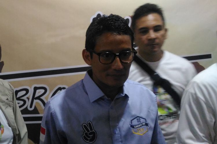 Calon wakil presiden nomor urut 02 Sandiaga Uno saat datang dalam acara alumni Pangudi Luhur di kawasan Jakarta Selatan, Rabu (13/2/2019). 