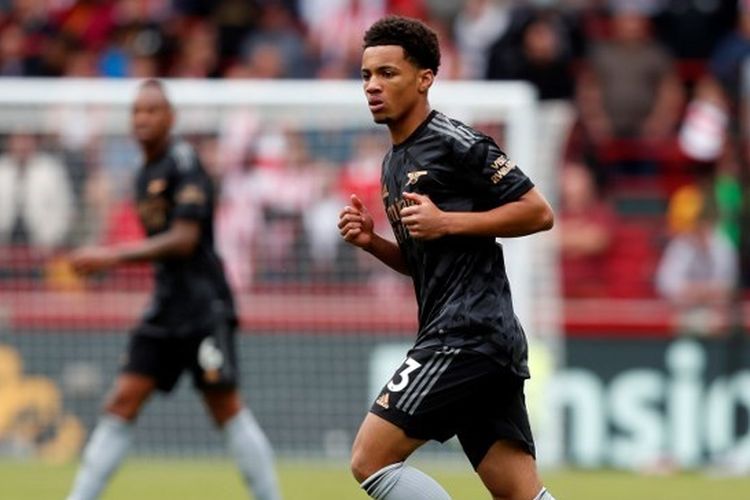 Aksi pemain muda Arsenal, Ethan Nwaneri, dalam laga kontra Brentford pada lanjutan Liga Inggris 2022-2023 di Brentford Community Stadium, London, Minggu (18/9/2022). (Photo by Ian Kington / AFP)