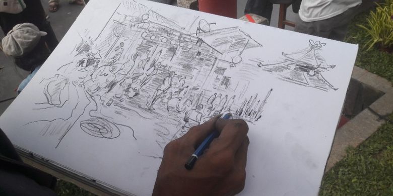 Proses pembuatan lukisan sketsa yang menggambarkan suasana perayaan Imlek di Vihara Dharma Bakti, Glodok, Jumat (16/2/2018)
