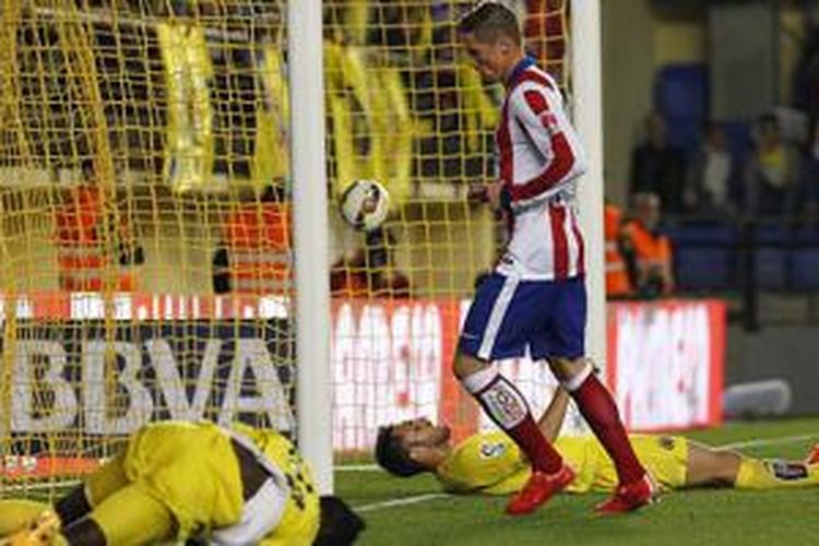 Fernando Torres mencetak gol tunggal kemenangan Atletico Madrid atas Villarreal, Rabu (29/4/2015). 