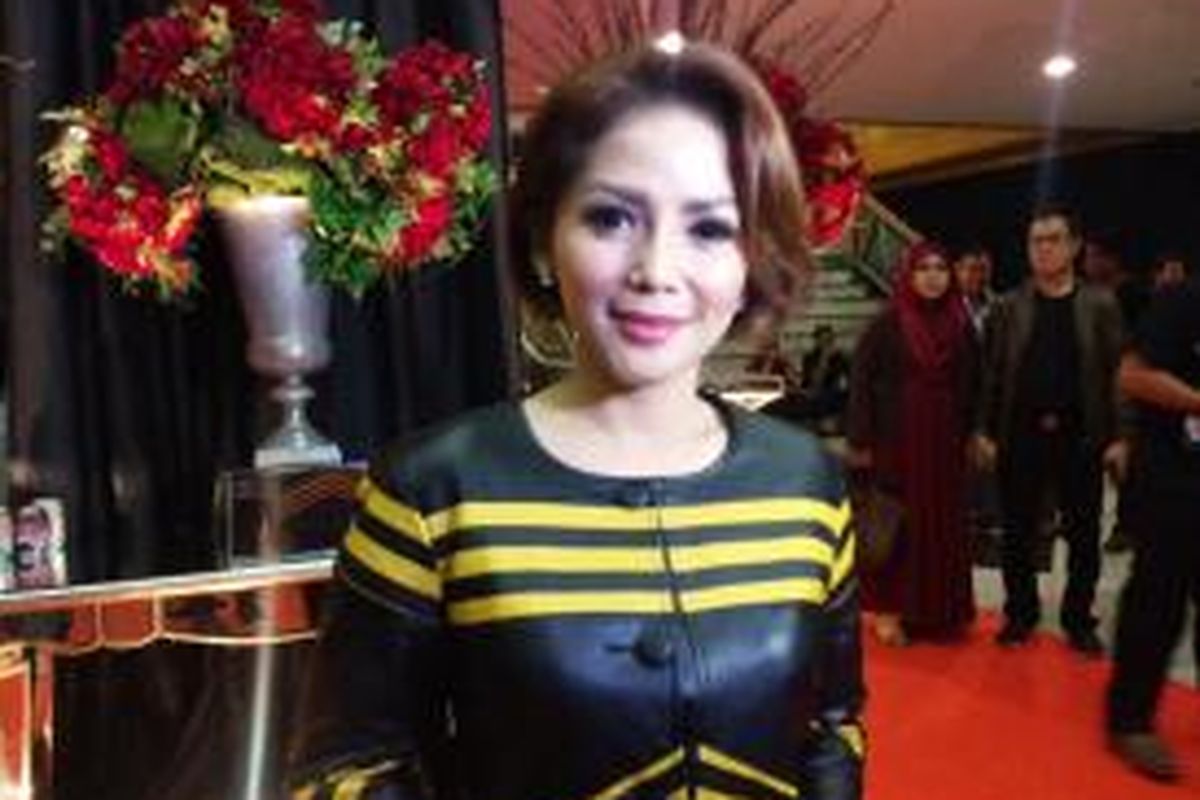 Kristina diabadikan usai menonton konser tunggal Krisdayanti yang berjudul 'Traya', di Plenary Hall Jakarta Convention Center (JCC), Jakarta Pusat, Minggu (3/5/2015) malam.