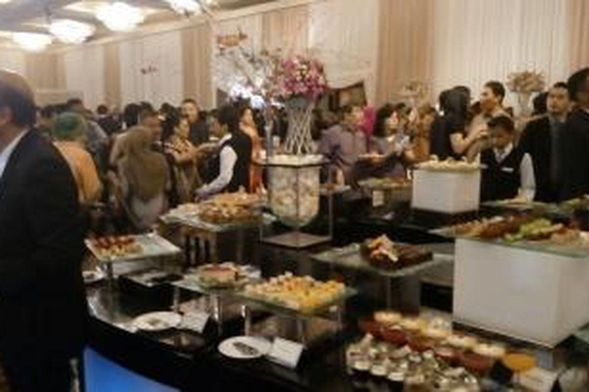 Suasana resepsi pernikahan putri Ketua DPR Setya Novanto, Dwina Michaella, dengan Jason Harjono di Hotel Mulia, Jakarta, Jumat (4/12/2015).