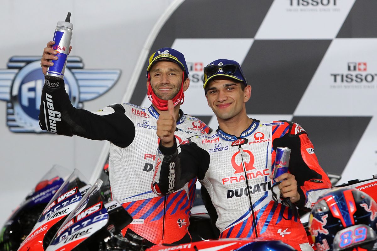 Pramac Racing's French rider Johann Zarco (L) and Pramac Racing's Spanish rider Jorge Martin celebrate their podium positions after the Moto GP Grand Prix of Doha at the Losail International Circuit, in the city of Lusail on April 4, 2021. (Photo by KARIM JAAFAR / AFP)