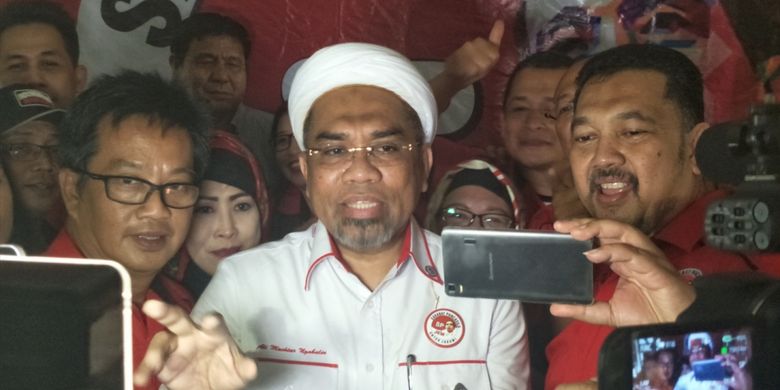 Tenaga Ahli Utama Kedeputian IV Bidang Komunikasi Politik dan Diseminasi Informasi Kantor Staf Presiden (KSP), Ali Mochtar Ngabalin, seusai menjadi salah satu pembicara dalam sebuah diskusi di kawasan Matraman, Jakarta Pusat, Sabtu (28/7/2018). 