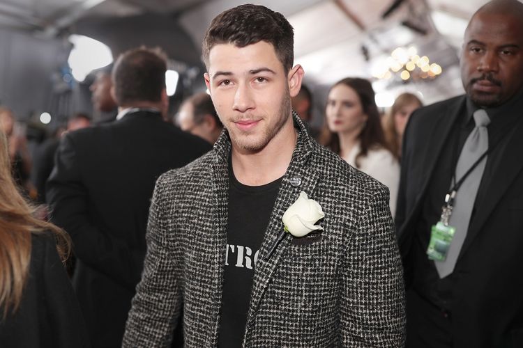 Penyanyi Nick Jonas menghadiri Grammy Awards 2018 di Madison Square Garden, New York, Minggu (28/1/2018).