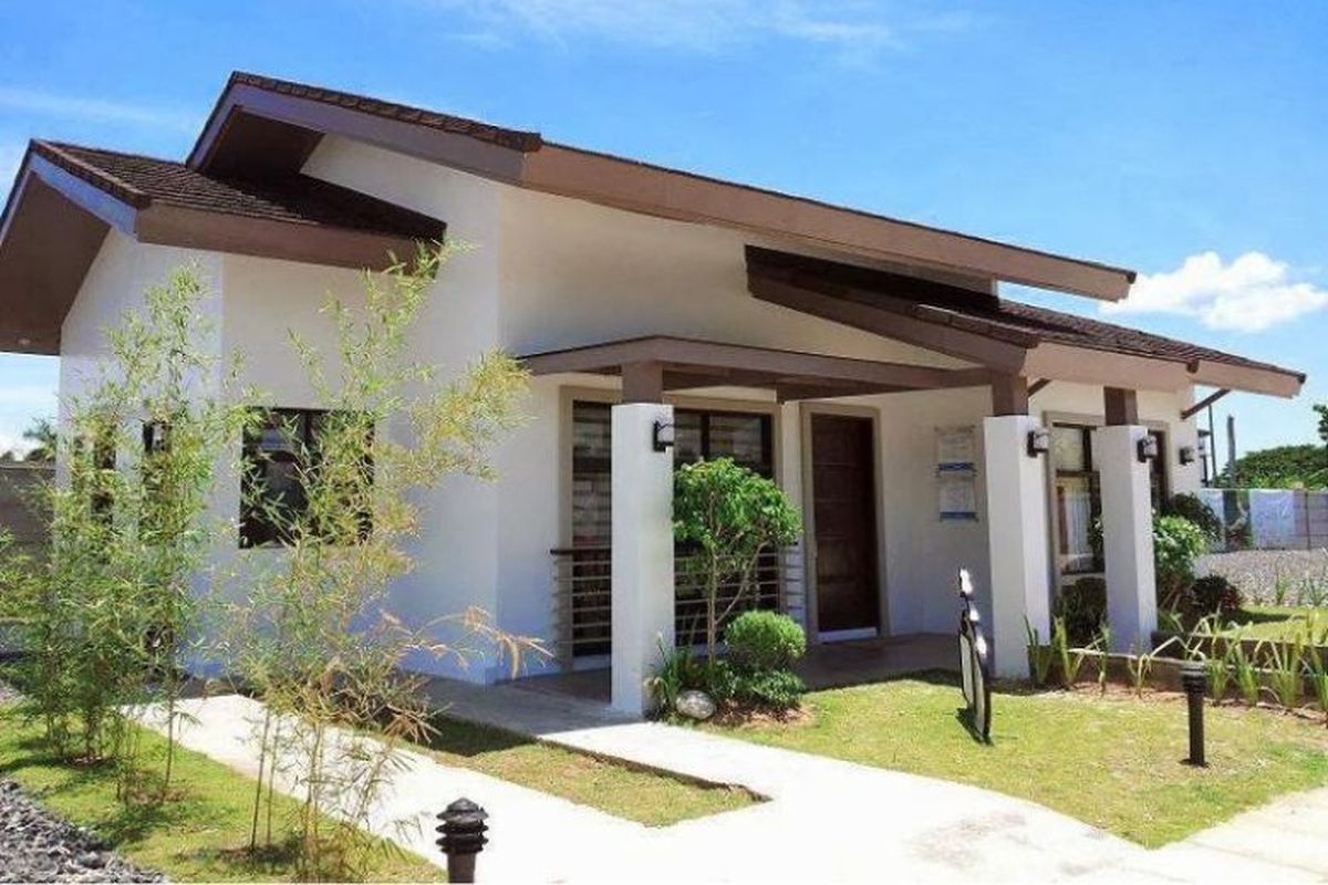 Rumah bergaya minimalis modern satu lantai. 