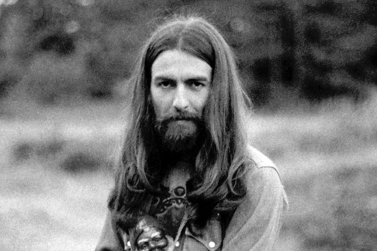 George Harrison musisi dan mantan gitaris dari The Beatles