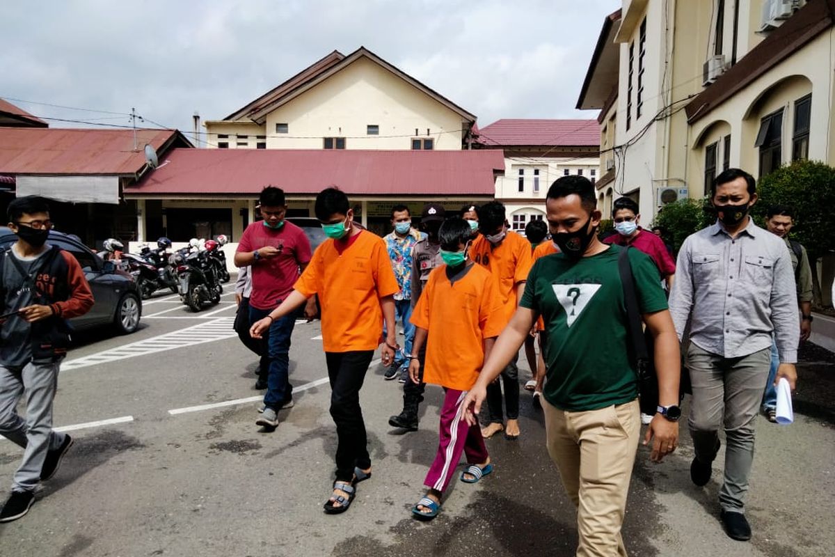 A photo of Lhokseumawe Police showing some suspects for allegedly trafficking Rohingya refugees from a temporary shelter in Aceh, Indonesia dated November 22, 2020. 