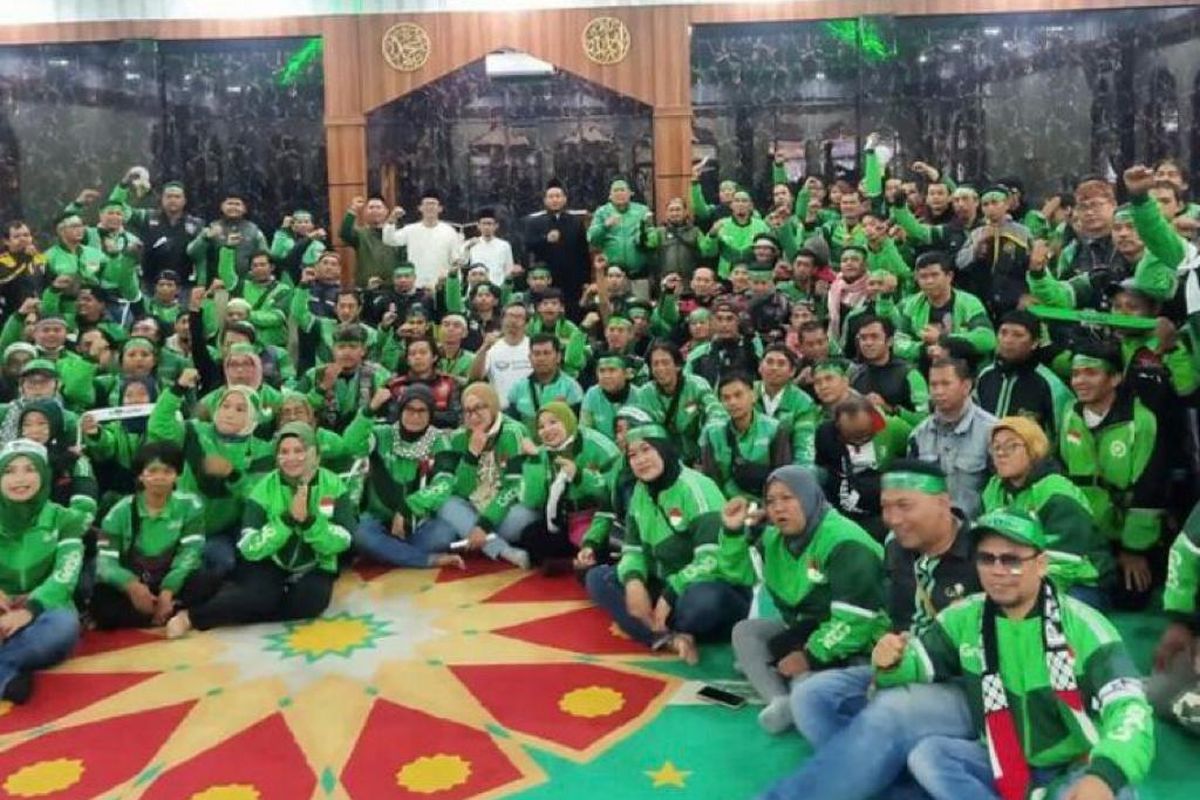 Driver Grab Indonesia gelar do a bersama untuk Palestina. Kegiatan ini dilaksanakan di sejumlah kota seperti Jakarta, Bandung, dan Makassar, Minggu (19/11/2023).