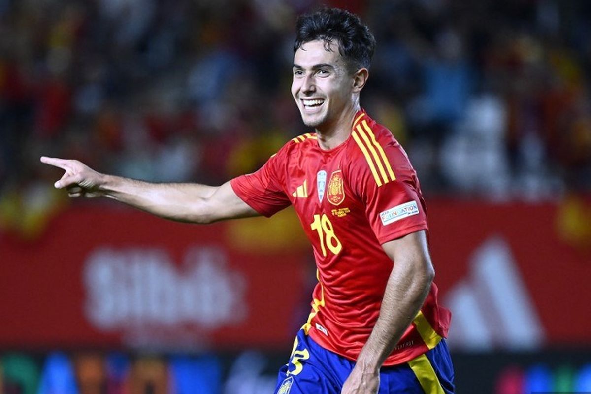 Martin Zubimendi merayakan gol dalam laga Grup A4 UEFA Nations League 2024-2025 antara Spanyol vs Denmark di Stadion Nueva Condomina di Murcia, pada 12 Oktober 2024. (Photo by JOSE JORDAN / AFP)