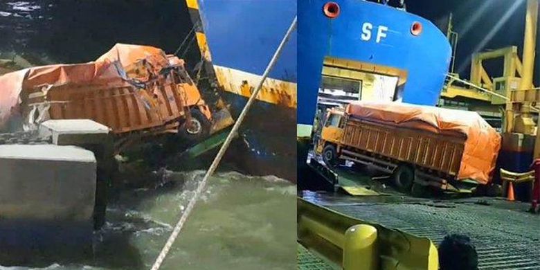 
Truk mengalami patah as roda dan menyangkut di ramp door kapal yang bersamaan dengan gelombang tinggi di perairan Pelabuhan Merak sehingga evakuasi gagal dan truk tercebur ke laut. 