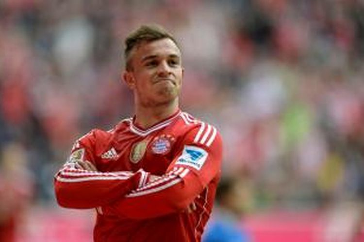 Selebrasi gelandang Bayern Muenchen, Xherdan Shaqiri, setelah mencetak gol dalam lanjutan Bundesliga 1 melawan SC Freiburg, Sabtu (15/2/2014). 