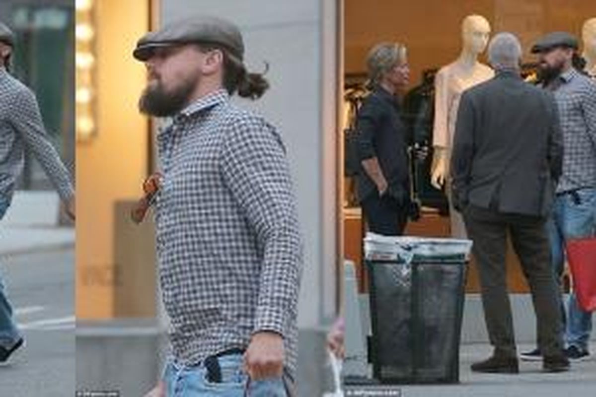 Leonardo DiCaprio tertangkap saat melintasi daerah pertokoan Madison Avenue, New York, Amerika Serikat.