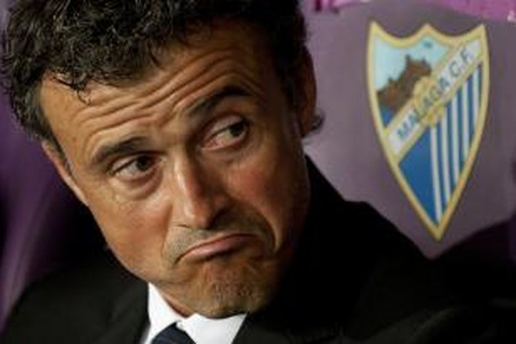 Salah satu ekspresi pelatih Barcelona, Luis Enrique, pada laga Primera Division melawan Malaga, di La Rosaleda, Malaga, 24 September 2014. 