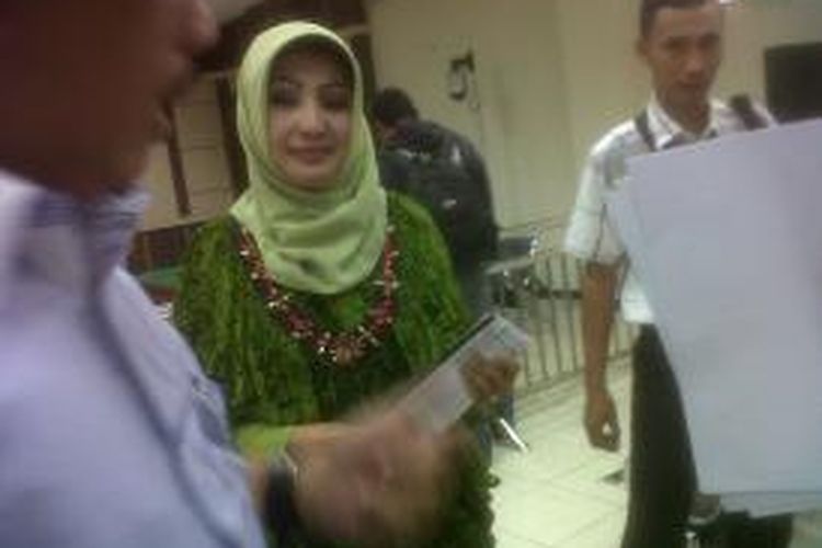 Eks Bupati Karanganyar, Rina Iriani usai sidang di Pengadilan Tipikor Semarang, Selasa (26/8/2014)