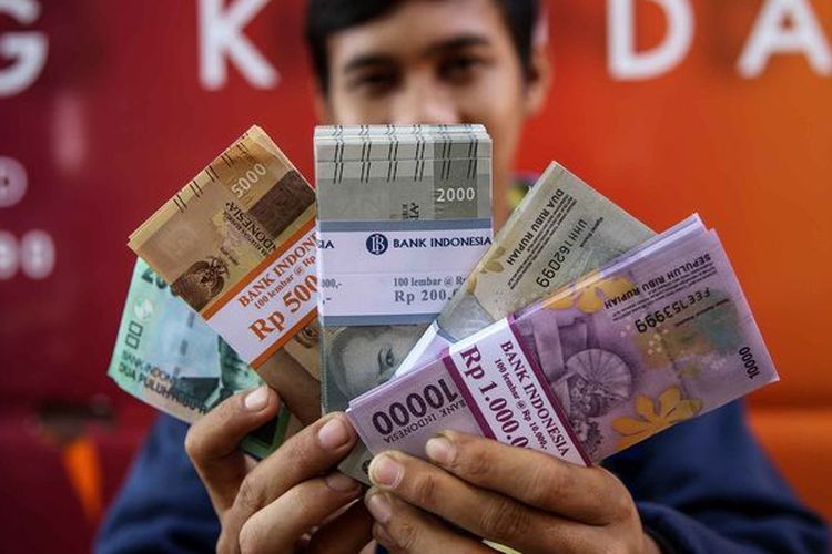 Ilustrasi penukaran uang baru jelang Lebaran 2024. Simak lokasi layanan penukaran uang rupiah baru di wilayah Serang, Banten selama periode Ramadhan 2024 dan Hari Raya Idul Fitri 1445 Hijriah.
