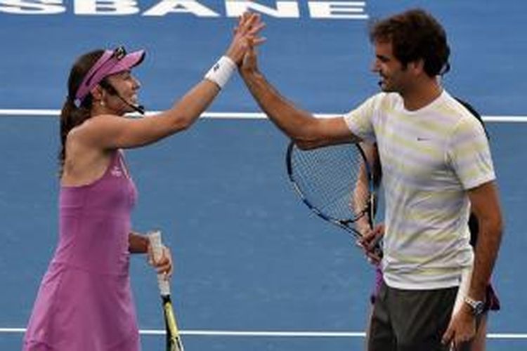 Martina Hingis dan Roger Federer saat bertanding pada turnamen Brisbane Internasional, Januari 2015 lalu. 