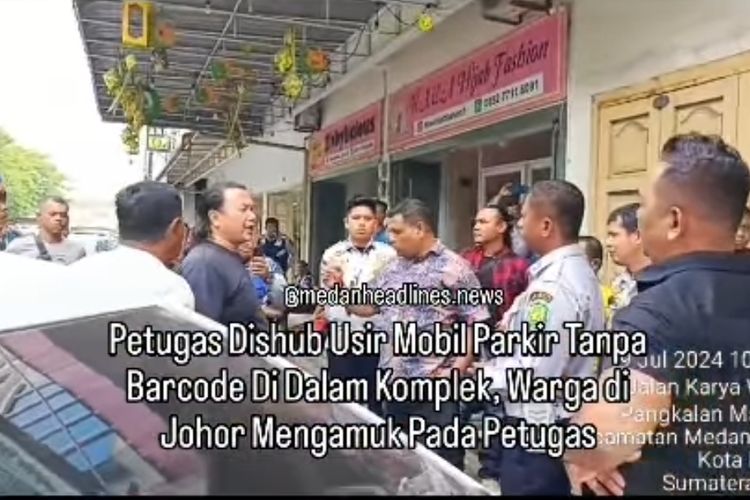 Potongan gambar perdebatan antara Petugas Dishub dengan warga terkait parkir berlangganan di Komplek Perumahan J City 
