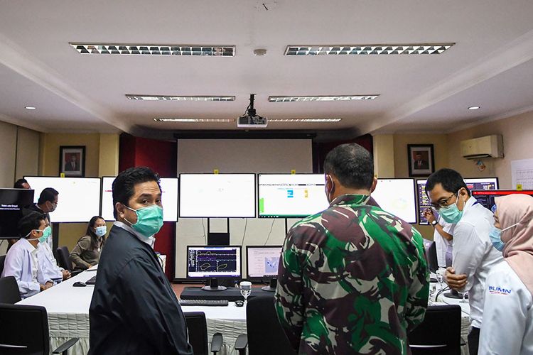 State-Owned Enterprises Minister Erick Thohir (left) visits the Command Center for handling the coronavirus at Pertamina Jaya Hospital in Jakarta on April 6, 2020. 