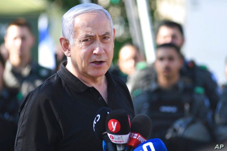FILE - Israeli Prime Minister Benjamin Netanyahu meets with Israeli border police, in Lod, near Tel Aviv, May 13, 2021.